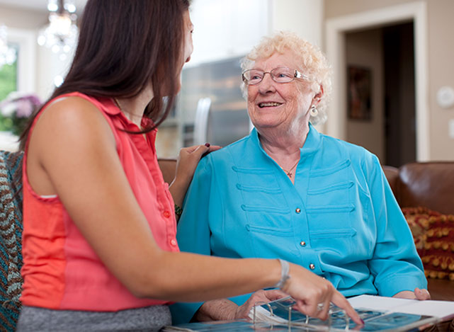 Caregiver and client reading